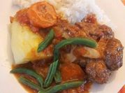 Una foto de ossobuco con champiñones