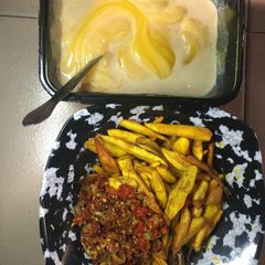 A picture of Sweet fried potatoe with sauce and pap 😋😋.