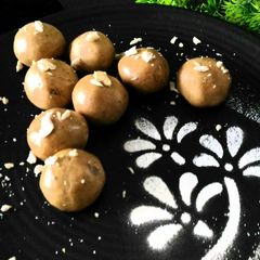 A picture of Wheat flour and flattened rice laddu.