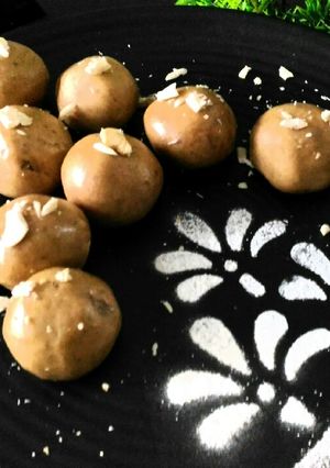 A picture of Wheat flour and flattened rice laddu.