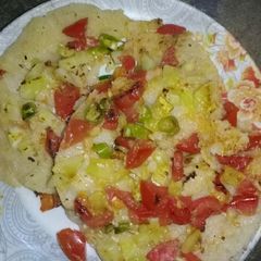 A picture of Without onion Rava Suji Uttapam.
