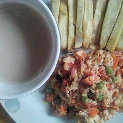 Chips & Chicken egg sauce with cocoa drink A picture of Chips & Chicken egg sauce with cocoa drink.