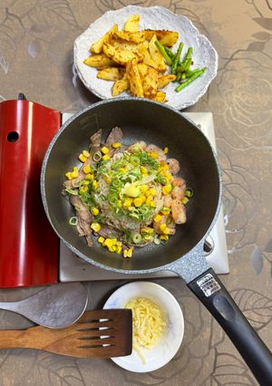 A picture of Fried Beef and Shrimp Rice on the Table.