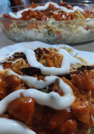 A picture of Chicken chilli Chinese rice.
