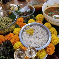A picture of Dal, Rice, Mushroom subji, bean, karala.