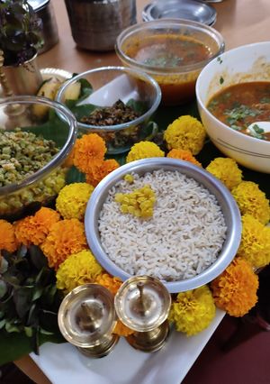 A picture of Dal, Rice, Mushroom subji, bean, karala.