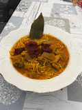 Fideos a la cazuela con setas de cultivo pollo y gamba
