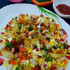A picture of Sweet Corn Tikki Chaat.