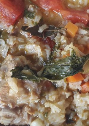 Una foto de Arroz aguado con riblet de cerdo 🐽