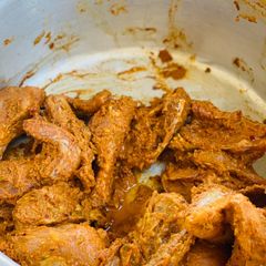 A picture of Chicken tikka marination.