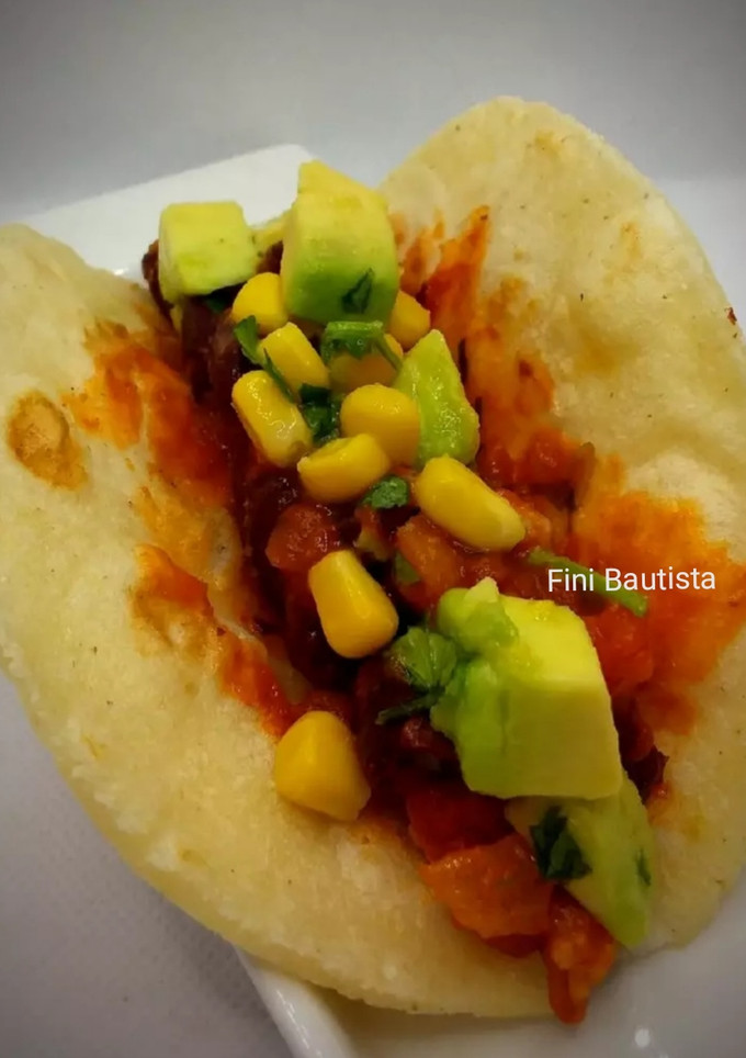 Una foto de Tacos de frijoles y aguacates(vegana)