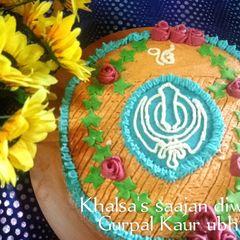 A picture of Khalsa's saajan diwas cake { Sikh religion birthday cake} 🎂🎉.