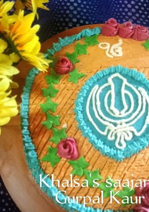 A picture of Khalsa's saajan diwas cake { Sikh religion birthday cake} 🎂🎉.