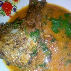 A picture of Fish soup in coconut milk.
