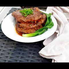 A picture of Honey and mustard pork chops.