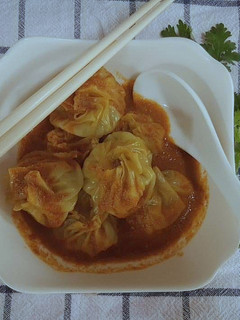 A picture of Homemade Nepali Jhol momo (dumpling with soup).