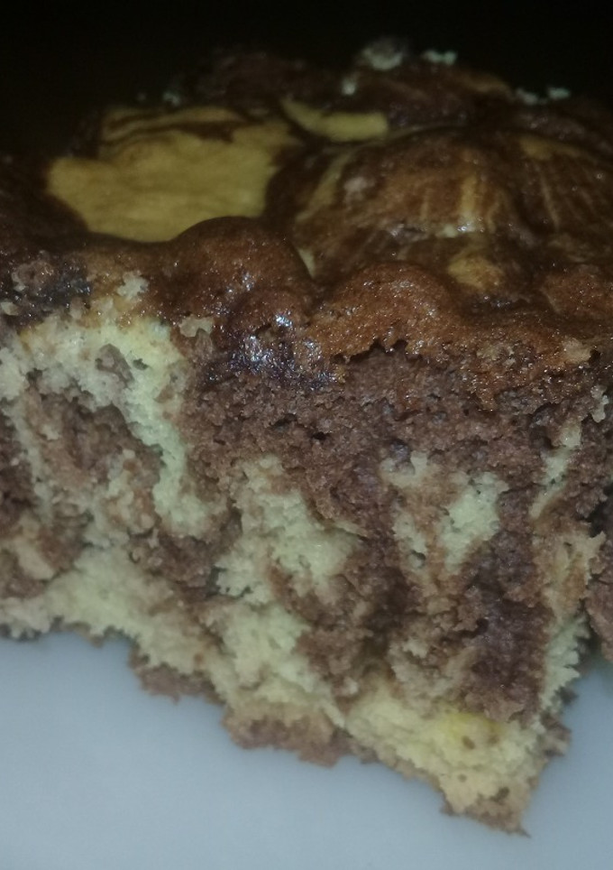 Una foto de Bizcochuelo marmolado, muy esponjoso😍