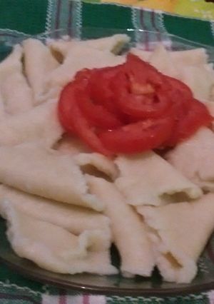 Una foto de Fideos de triangulos