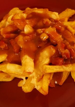 Une photo de Poutine Savoyarde
