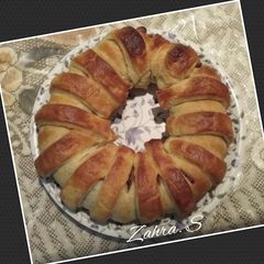 Puff pastry ring with chicken filling A picture of Puff pastry ring with chicken filling.