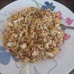 Una foto de Arroz tipo chino a mi estilo