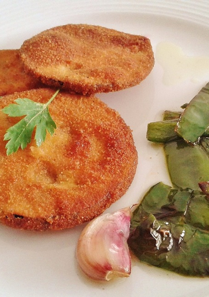 Una foto de Berenjenas empanadas