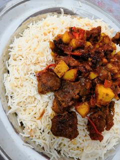 صورة لوصفة رز بخاري مع ايدام لحمة