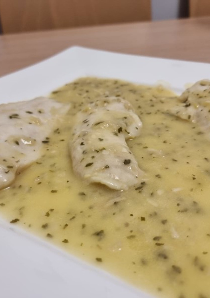 Una foto de Merluza en salsa verde