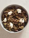Arroz negro con calamares de lata