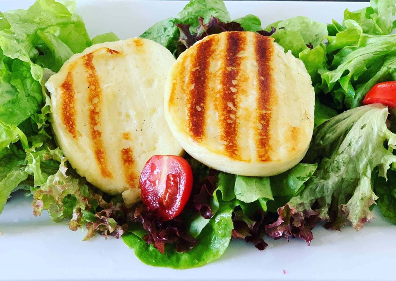 Grilled cheese on a salad leaf