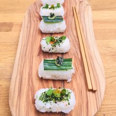 A picture of Brown rice vegetable sushi with salt and lemon edamame beans🌱🍱.