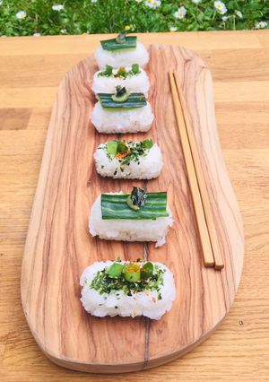 A picture of Brown rice vegetable sushi with salt and lemon edamame beans🌱🍱.