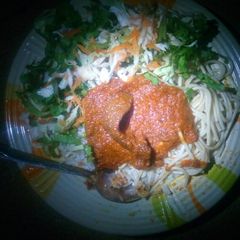 A picture of Rice, spaghetti with stew and salad.