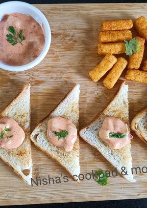 A picture of Thousands Island sauce(homemade) with bread Toast.