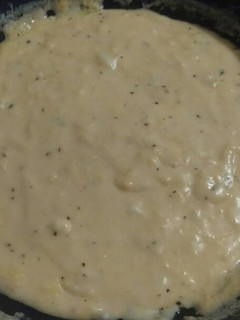 A picture of Elisa's Garlic & Herb Cheese Sauce.