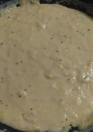 A picture of Elisa's Garlic & Herb Cheese Sauce.