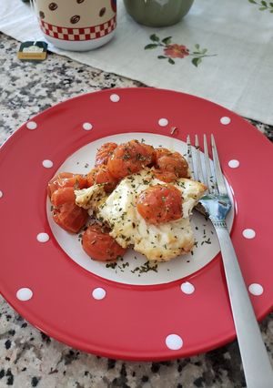 A picture of Tomato 🍅 with feta cheese 🧀.