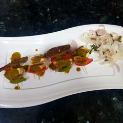 A picture of Sprout moong chilla with paneer tikka.