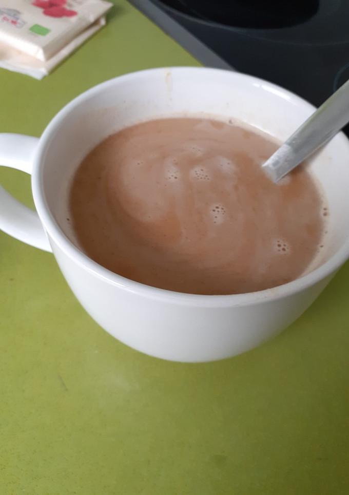 Una foto de Café de calabaza especiado (pumpkin spice latte)