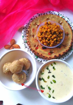 A picture of Khuba roth & spicy chickpea lentil & dry fruit kheer millet ladoo.