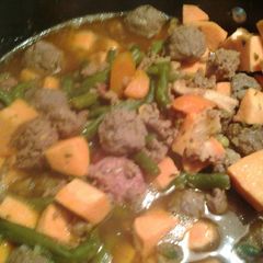 A picture of Mini meatball soup.