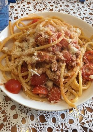 A picture of Bucatini Puttanesca with Sausage.