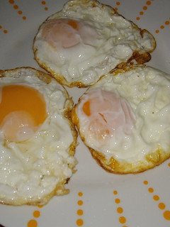 Una foto de Huevos fritos con bacon