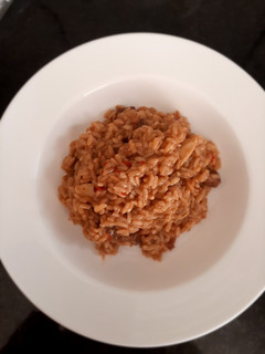 Una foto de Risotto tinto 🍷