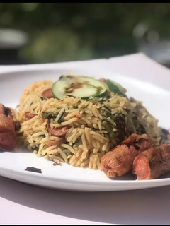 A picture of Spicy sausage and spinach rice.