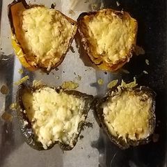 A picture of Simple and tasty, cheese and onion baked peppers.