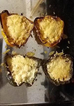 A picture of Simple and tasty, cheese and onion baked peppers.