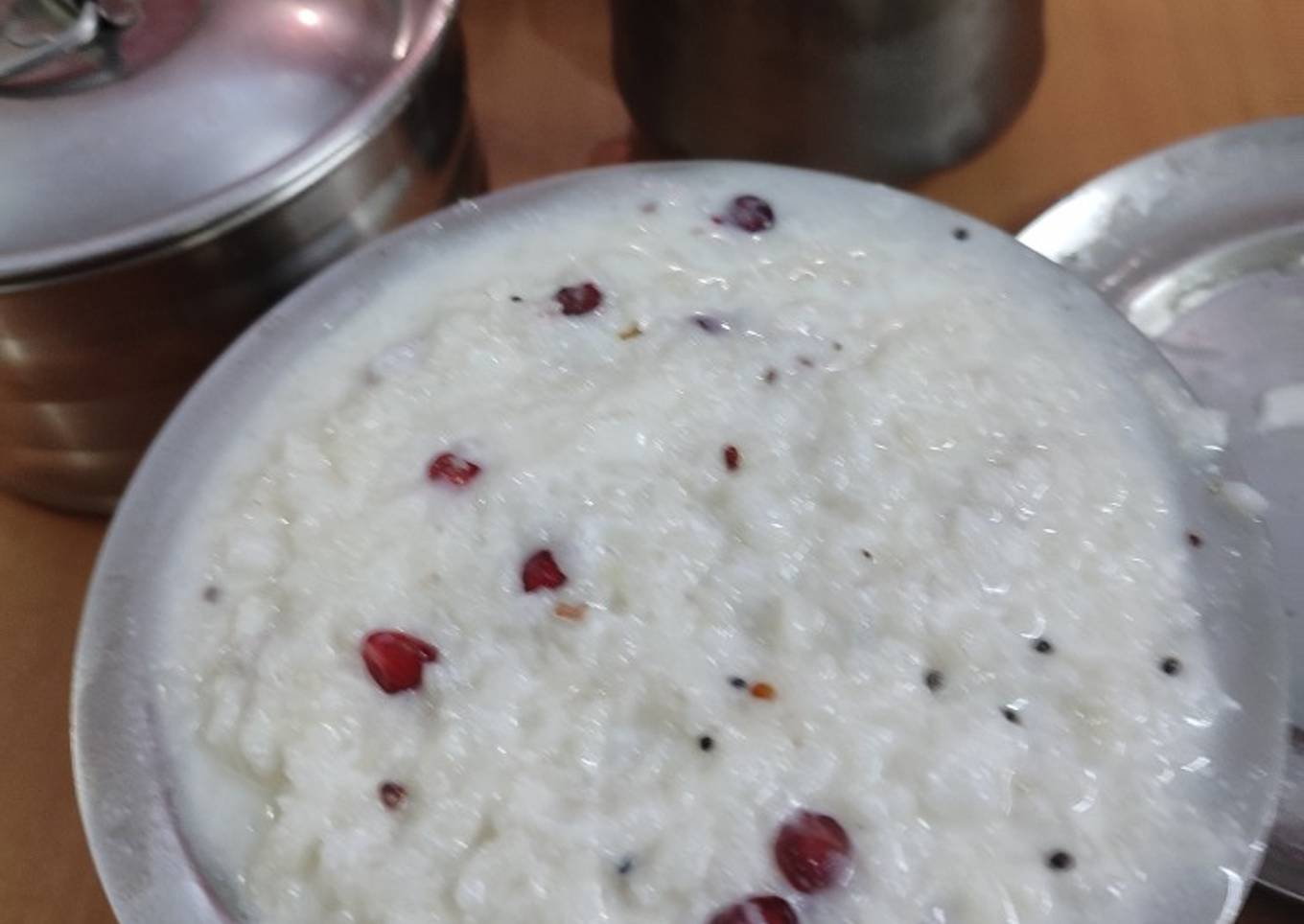 Curd rice with fruit anar