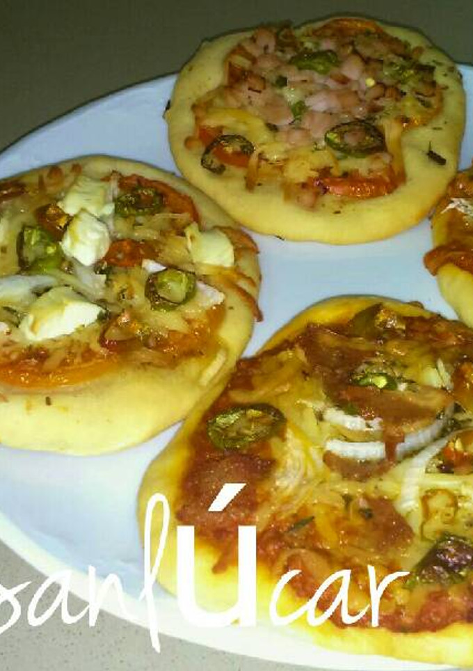 Una foto de Mini pizzas caseras de masa esponjosa