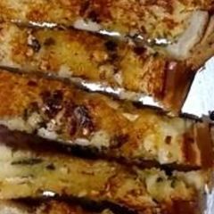 A picture of Garlic bread sticks.